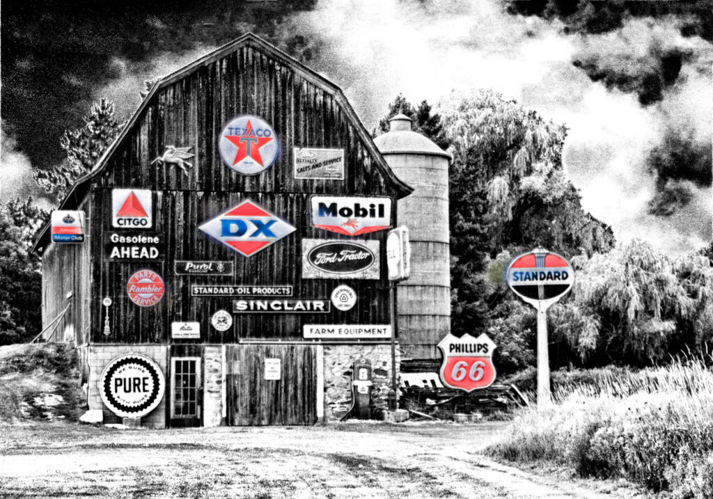 Colored Gasoline Signs on Barn by John Larson