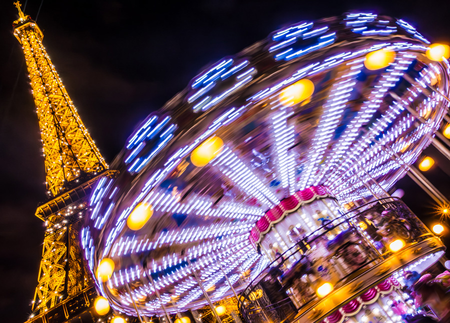 Theme: Motion, Long Exposure, June 2024 – first place: Lisa Marie Cirincione, “Eiffel Tower and Merry-Go-Round”
