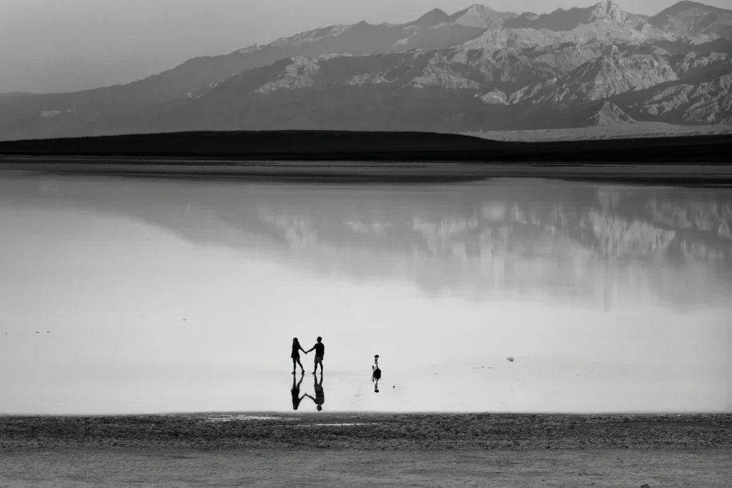 Couple Reflection Bad Water Basin DV, photograph by David Whiteman