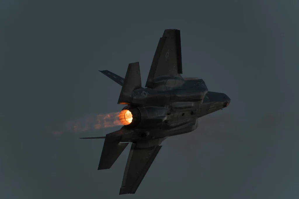 F-35A flown by Major Melanie "MACH" Kluesner at dusk Sun N' Fun air show, photograph by Sam Knutson
